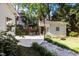 View of backyard showing patio, shed, landscaping, and basketball court at 1811 Ridley St, Raleigh, NC 27608