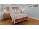 Cozy bedroom with hardwood floors, natural light, and neutral color scheme at 1811 Ridley St, Raleigh, NC 27608