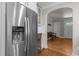 Stainless steel refrigerator with water dispenser in a bright, updated kitchen at 1811 Ridley St, Raleigh, NC 27608