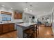 Bright kitchen featuring stainless steel appliances, a central island with seating, and modern lighting at 1811 Ridley St, Raleigh, NC 27608