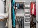 Organized walk-in closet with hanging rods, shelves, and plenty of storage space at 1811 Ridley St, Raleigh, NC 27608