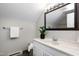 Modern bathroom featuring a stylish vanity, decorative mirror, and neutral color palette at 1821 Kelly Glen Dr, Apex, NC 27502