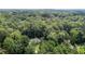 An aerial view of a house surrounded by a forest at 186 Ross Dr, Pittsboro, NC 27312