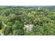 An aerial view of a house surrounded by trees at 186 Ross Dr, Pittsboro, NC 27312