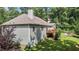 View of the back of the house featuring a deck, backyard and firepit at 186 Ross Dr, Pittsboro, NC 27312