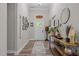 Inviting foyer featuring wood-look flooring, neutral decor, and decorative accents on a console table at 186 Ross Dr, Pittsboro, NC 27312