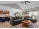 Open-concept living area seamlessly blends the kitchen, living room, and dining spaces for modern living at 186 Ross Dr, Pittsboro, NC 27312