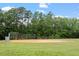 Community baseball field featuring a chain-link fence and green space on a sunny day at 1990 Ferbow St, Creedmoor, NC 27522