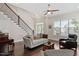 Cozy living room featuring high ceilings, lots of natural light, and hardwood floors at 220 W Winmore Ave, Chapel Hill, NC 27516