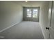 Neutral bedroom with carpet and windows at 231 Paramount Dr, Smithfield, NC 27577