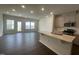Modern open-concept kitchen with a large island and lots of natural light at 231 Paramount Dr, Smithfield, NC 27577