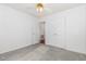 Bright bedroom featuring neutral carpet and a ceiling fan at 2312 Buckstone Ct, Fuquay Varina, NC 27526