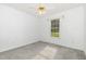 Bedroom featuring carpeted floors and a single window at 2312 Buckstone Ct, Fuquay Varina, NC 27526