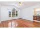 Main bedroom with hardwood floors, vaulted ceiling and attached bathroom at 2312 Buckstone Ct, Fuquay Varina, NC 27526