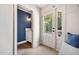 Inviting entryway with powder room and ample natural light at 2409 Basil Dr, Raleigh, NC 27612