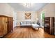 Cozy living room featuring hardwood floors and neutral wall colors at 2409 Basil Dr, Raleigh, NC 27612