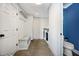 This spacious mudroom features built-in storage and laundry area at 2409 Basil Dr, Raleigh, NC 27612