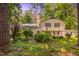 Inviting two-story home with manicured landscaping and brick accents at 256 Marilyn Cir, Cary, NC 27513