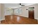 Elegant living room filled with natural light and features gleaming hardwood floors at 2609 Elmhurst Cir, Raleigh, NC 27610