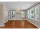 Hardwood floors and natural light create a warm ambiance in this inviting living space at 2609 Elmhurst Cir, Raleigh, NC 27610