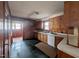 Cozy kitchen features wood cabinets and an open layout at 2705 Royster St, Raleigh, NC 27608