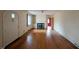 Spacious living room featuring hardwood floors, fireplace, and natural light at 2705 Royster St, Raleigh, NC 27608