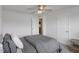 Cozy bedroom featuring a ceiling fan, natural light, and neutral decor at 273 Millennium Dr, Pittsboro, NC 27312