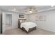 Comfortable bedroom with a tray ceiling, soft lighting, and a cozy bed, offering a peaceful and restful environment at 273 Millennium Dr, Pittsboro, NC 27312