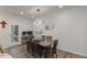 The dining room includes a modern light fixture and an adjacent desk area, perfect for work or study at 273 Millennium Dr, Pittsboro, NC 27312