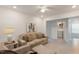 Relaxing living room featuring a comfortable sofa, cozy seating, and a serene ambiance, perfect for unwinding at 273 Millennium Dr, Pittsboro, NC 27312