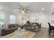 Spacious living room featuring a ceiling fan, recessed lighting, and comfortable seating, ideal for Gathering gatherings at 273 Millennium Dr, Pittsboro, NC 27312