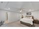 Serene main bedroom with a tray ceiling, neutral colors, and ample space, creating a peaceful and relaxing atmosphere at 273 Millennium Dr, Pittsboro, NC 27312