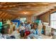 Attic storage featuring exposed wood beams and unfinished walls and floors at 2750 Michelle Ct, Creedmoor, NC 27522