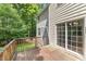 Exterior view of wood back deck with sliding glass doors to the home's interior at 2750 Michelle Ct, Creedmoor, NC 27522