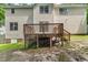 Backyard of home with the wood deck, lawn, and siding at 2750 Michelle Ct, Creedmoor, NC 27522