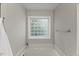 Bathroom with a glass block window letting in natural light above the tub at 2750 Michelle Ct, Creedmoor, NC 27522