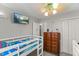Bunk beds in ' room with dresser, closet, TV, and fan at 2750 Michelle Ct, Creedmoor, NC 27522