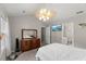 Bright primary bedroom featuring vaulted ceilings, ceiling fan, and large windows at 2750 Michelle Ct, Creedmoor, NC 27522