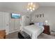 Comfortable bedroom with vaulted ceiling, TV and windows providing natural light at 2750 Michelle Ct, Creedmoor, NC 27522
