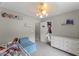 Bedroom featuring carpet, a bed, and a dresser with a closet nearby at 2750 Michelle Ct, Creedmoor, NC 27522