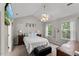 Comfortable bedroom with vaulted ceiling, TV and windows providing natural light at 2750 Michelle Ct, Creedmoor, NC 27522