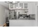 Stylish kitchen with gray countertops, white cabinetry and stainless steel appliances at 2750 Michelle Ct, Creedmoor, NC 27522