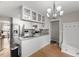 Modern kitchen with stainless steel appliances, ample cabinet space, and functional island at 2750 Michelle Ct, Creedmoor, NC 27522