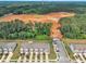 Aerial view of a construction site in a neighborhood surrounded by trees and residences at 287 White Oak Ridge Dr, Garner, NC 27529