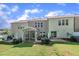 Spacious townhouse backyard with well-maintained landscaping and a screened porch at 287 White Oak Ridge Dr, Garner, NC 27529