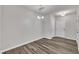 Bright dining area with attractive hardwood floors and a modern chandelier ready for personalization at 287 White Oak Ridge Dr, Garner, NC 27529