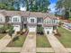 Charming townhome complex with attached garages, well manicured lawns and tree lined streets at 287 White Oak Ridge Dr, Garner, NC 27529