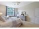 Bright main bedroom features neutral tones, ceiling fan and outdoor access to the backyard at 3058 Hyco Lake Ct, Fuquay Varina, NC 27526