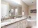 Bright bathroom features double sinks with granite countertops and a large soaking tub perfect for relaxation at 3652 E Cotton Gin Dr, Clayton, NC 27527