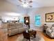 This open-concept living room flows into the kitchen, offering a great space for entertaining and Gathering gatherings at 3652 E Cotton Gin Dr, Clayton, NC 27527